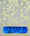 7 Inch 3D Rose Pattern Paint Roller Reusable Texture Tool Without Handle For Walls stamped against a gold floral design.