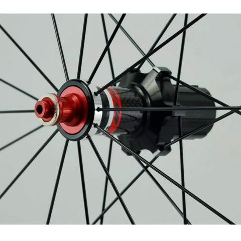 Close-up of Badass 700C Road Bike Wheelset with Carbon Fiber Hub and CV Brake Compatible Sealed Bearings