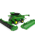 Prestige X9 1100 Farm Style Combine with die-cast body, clear windows, dual front wheels, feeder housing, rotating auger, folding heads.