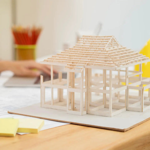 Model house on desk built with ABS Plastic Round Rod 0.5mm By 250mm White For DIY Model Making And Architectural Projects Pack Of 25 Thin Rods.