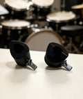 Secure Cymbal Positioner Limiter Stops Anti-rotation For 26.5mm And 35mm Metal Holders Electronic Drum Stopper Easy Install No Tools Needed Safe Stable Fixation Keeps Your Gear Locked In Tight view of two black cymbal positioner limiters on a table