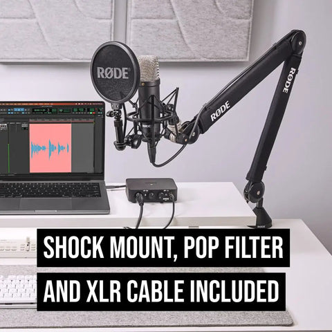 Signature Series Large Diaphragm Condenser Mic with shock mount, pop filter, XLR cable on a desk with audio interface and laptop