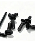 Badass Heavy Duty 4Pc M5 Countersunk Bolts 12.9 Grade Alloy Steel Flat Head Socket Cap Screws With Allen Hex Drive 75mm Length laid out with hex key.