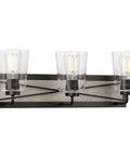 Three-Light Coastal Bath Vanity Light With Clear Glass, Rustic X-Brace Design, Faux Woodgrain Backplate, Graphite Black Finish