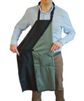 Man wearing Black Waterproof Apron With Two Pockets 35 Inch Heavy Duty Plastic Dishwashing And All Purpose Work Apron
