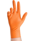 Orange nitrile disposable glove on hand with raised diamond-textured grip