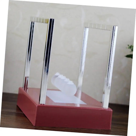 Glowing Pendulum Desk Decor Newton's Cradle Ornament For Home Office Demonstrates Physics Energy Conservation Battery Operated Fun Requires 4 AA Batteries Not Included, red base on desk