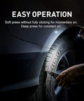 Compact AAA Powered EDC Flashlight For Camping And Hiking With Tail Switch 180 Lumens Beam in use on car tire at night