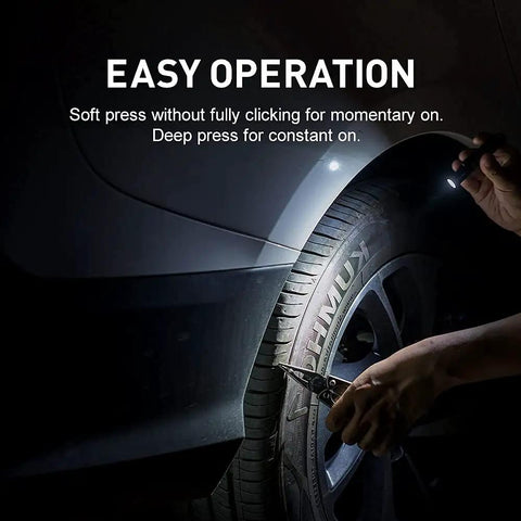 Compact AAA Powered EDC Flashlight For Camping And Hiking With Tail Switch 180 Lumens Beam in use on car tire at night