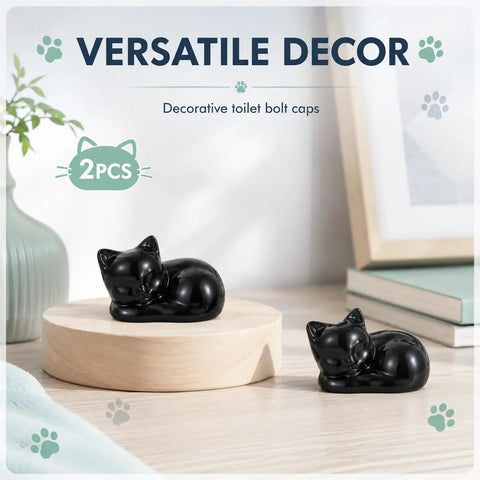 Two black cat-shaped toilet bolt caps on a wood platform for decor, part of Straight Up Adorable Cat Shaped Ceramic Toilet Bolt Covers.