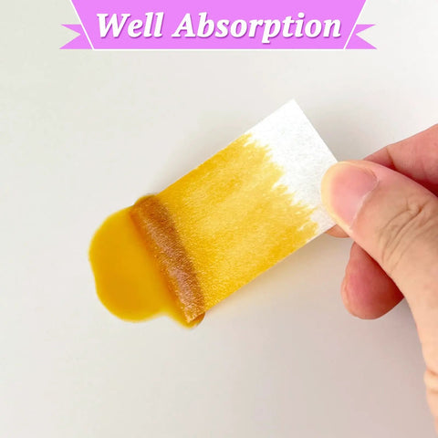 Lint Free Nail Wipes And Gel Polish Remover Pads Set With Cuticle Pushers showing absorption with liquid on cotton pad