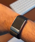 Dual Device Band Adapter Frame For Air To 5.0 Wearables With Interchangeable Nylon Elastic And Silicone Straps For All Day Comfort No Fuss Fit Flexible Arm Placement And Interference Free Monitoring black bracket on wrist with nylon strap