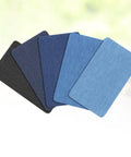 Badass Adhesive Jean Repair Patches 5 Piece Set Featuring Rad Designs Perfect For Fixing Tattered Denim Jeans And Jackets Quick Iron On Stickers And Seamless Sewing Hacks, assorted durable cloth patches in various shades.
