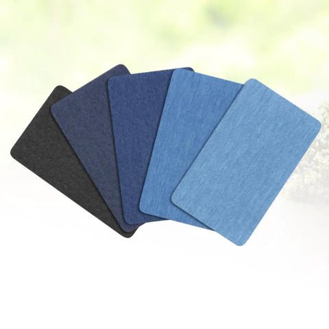 Badass Adhesive Jean Repair Patches 5 Piece Set Featuring Rad Designs Perfect For Fixing Tattered Denim Jeans And Jackets Quick Iron On Stickers And Seamless Sewing Hacks, assorted durable cloth patches in various shades.