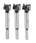 Heavy Duty Rock Solid 3 Piece Forstner Drill Bit Set Featuring Sharp Tungsten Carbide Tips For Clean Wood Drilling And Precision Hole Cutting 3 4 25 32 13 16 Inches And 5 16 Shank close-up of the three drill bits.