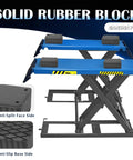 Solid rubber block on a scissor lift, designed for stability and safety during vehicle maintenance.