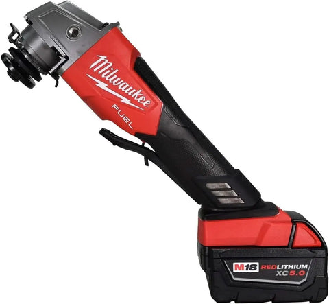 Kickass Brushless Cordless Two Piece Power Duo Combining 18 Volt Four Point Five Inch Grinder With Three Eighth Impact Wrench Paired With Two Tough Five Amp Batteries Made For Quick Fixes And All Day Job Site Grinds - Milwaukee M18 Fuel impact wrench with REDLITHIUM XC 5.0 battery.