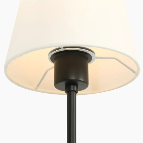 Close-up of KSANA Modern Black Wall Scone Lighting Indoor with White Fabric Shade, showcasing the black socket and white shade details.