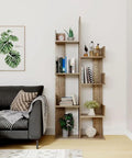 Cactus Shaped Four Tier Bookshelf With Open Cube Shelves Standing 61.4 Inches Tall near black sofa in a modern living room