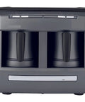 Kickstart Your Daily Routine With This Nifty Double Cup Coffee Maker That Uses Gentle Steam To Whip Up Bold Espresso Smooth Lattes And Rich Cappuccino In A Jiffy Easy On Off Switch For Compact Kitchens And Busy Workspaces. Grey coffee maker with dual cup holders and push controls.