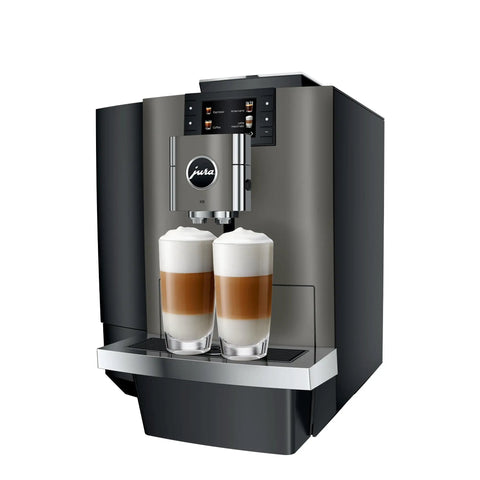 Premium Top Shelf Fully Automatic Coffee Machine Featuring Cold Brew Options And Thirty Four Recipes With Smart Touchscreen pouring lattes.