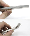 Close-up of hand holding 12mm Hex Key Wrench Set 2 Pcs Precision L Shaped Allen Wrenches Durable Metric Hex Spanner