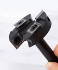 Close-up of CNC Spoilboard Surfacing Router Bit With One Half Inch Shank And Two Inch Cutting Diameter, Balanced Two Plus Two Carbide Inserts For Slab Flattening And Planing, Industrial Grade Woodworking Tool