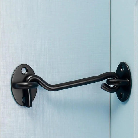 Close-up of Heavy Duty Sliding Barn Door Hardware Kit Includes Two Premium 3 Inch Steel Hook And Eye Latch mounted on a blue door.