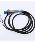 Inductive Proximity Switch Sensor LJ12A3-4 PNP/NPN 4mm Sensing Distance Built Tough Plastic Metal Housing With Smooth Onoff Control For Stable Circuit Switching, Ideal For Industrial Automation, Robotic Arms, And Conveyors. M12 threaded metal sensor with cable