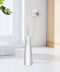 Charger Cord For WF-20 Cordless Flosser Replacement 5V 2A Power Adapter in use, plugged into wall, 1.5M cable, white