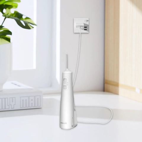 Charger Cord For WF-20 Cordless Flosser Replacement 5V 2A Power Adapter in use, plugged into wall, 1.5M cable, white