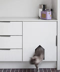 Modern kitchen cabinet with hidden door knob set and concealed handles, featuring sleek low profile aluminum alloy drawer pulls.