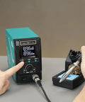 Person using Beefy 300W Soldering Station for stained glass with adjustable temperature and detachable iron, three tips, and presets.