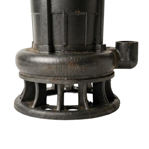 Close-up of submersible grinder pump for wastewater with built-in debris macerator system and rugged black material.