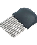 Side view of crinkle cutter with stainless steel wavy blades and black handle for vegetables