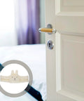 Cute White Fluff Door Stopper With Anti Slam Clip on open door, kid-safe design for noise reduction and protection.
