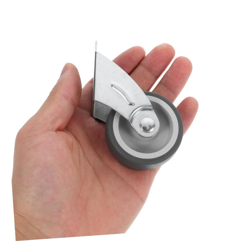 Hand holding grey metal and plastic Sagging Sliding Door Guide Roller Wheel For Barn Doors Durable Bottom Support