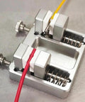 Pro Grade Soldering Station Wire Clamp Fixture Table For Stable Circuit Board Assembly shown clamping red and yellow wires