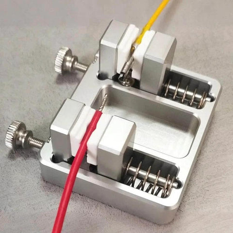 Pro Grade Soldering Station Wire Clamp Fixture Table For Stable Circuit Board Assembly shown clamping red and yellow wires