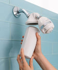 Person installing Shower Water Filter Replacement Cartridge For AQ-4125, twist-in under showerhead, blue tile background