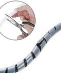 Clear Spiral Cable Wrap 12mm for Half Inch Cables being cut to length, showing flexible DIY cord organizer sleeve in use.