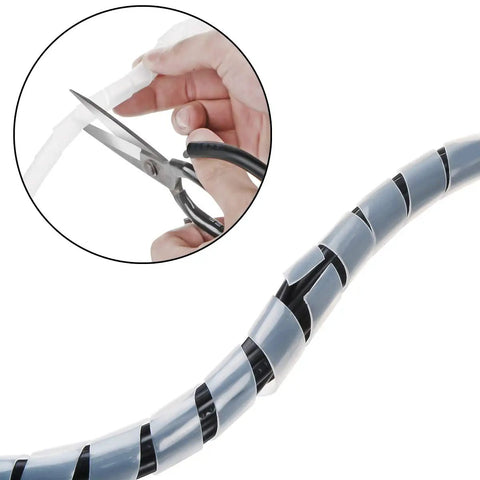 Clear Spiral Cable Wrap 12mm for Half Inch Cables being cut to length, showing flexible DIY cord organizer sleeve in use.