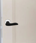 4 Pack Tough Neoprene Door Handle Covers Rock Solid Weatherproof Shield on door handle providing grip and protection.