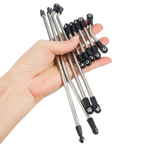 Optional Stainless Links for Ultra Light Carbon Fiber LCG Chassis Kit For 1/10 RC Crawler Rigs held in a hand