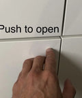 Smooth Push To Open Cabinet Door Dampers With Magnetic Lock Set Of Three Handleless Drawer Latches For Modern Kitchen Furniture Silver Metallic Finish Easy Click Action No More Fumbling, hand pressing cabinet door.
