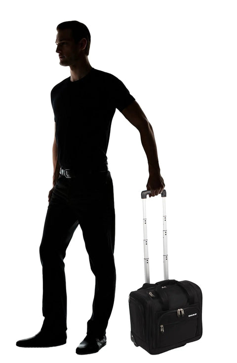 Person holding an Under Seat Carry On Bag With Rolling Wheels For Airline Travel Your Go To 15 Inch Personal Item That Fits Easy Lightweight 4 Lb Case Sized 15 By 9 By 14 Inches With Durable Build And Limited 5 Year Warranty.