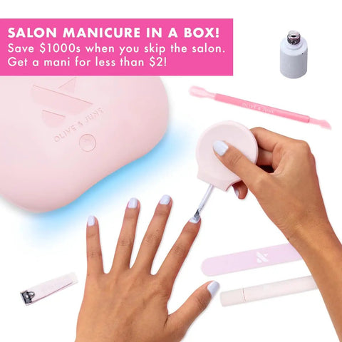 Applying polish from the All In One Gel Mani Kit For At Home Nail Care With Pro Quality LED Lamp Gel Base Coat Gel Top Coat Peel Off Base Coat