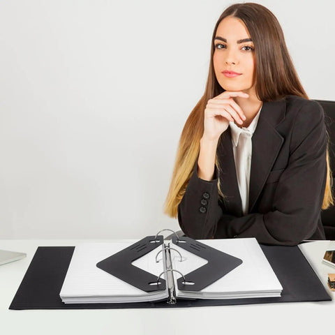 Heavy Duty Triangle Sheet Lifters For Three Ring Binders Kick Paper Curl To The Curb With These Solid Plastic Page Protectors 12 Pack on a desk.