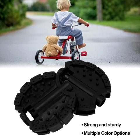 Two Piece Plastic Kids Pedals Set For Tricycles And Bikes Black Non Slip Foot Pedals Front Wheel Mat Foot Rest shown with child.
