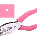Mini One Quarter Inch Circle Hole Punch with pink soft grip for DIY, showing metal build with hole punch example